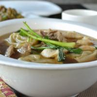 Wor Wonton Soup 窩雲吞湯 · With chicken, beef, shrimp, and house made pork wontons.