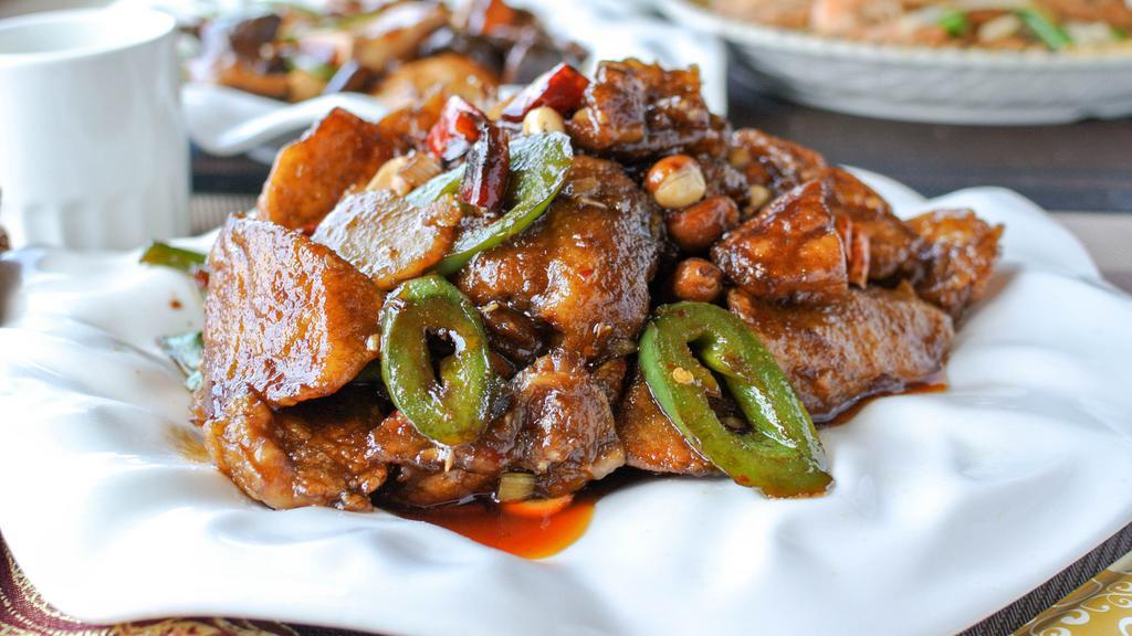 🆕 Kung Pao Eggplant 宫保茄子 · Eggplant stir-fried in a sweet and spicy sauce, with dried chili, scallions and peanuts.