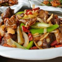 Pork Sparerib and Intestine Stir Fry 骨肉肠连 · Pork ribs and sliced pork intestines stir fried with onions, scallions, dried chili pepper, ...
