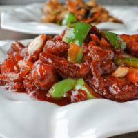 Sweet and Sour Pork Intestine 焦溜豬大腸 · Fried pork intestines, stir-fried in a sweet and sour sauce with bell peppers.