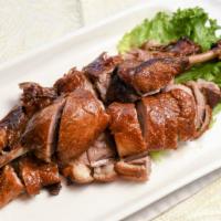 Tea Smoked Duck 樟茶鴨 · Duck smoked with tea and Sichuan seasoning, roasted and fried for a crispy skin.