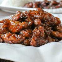 Orange Beef or Lamb 陳皮牛/羊 · Sliced beef or lamb, fried and coated in a zesty orange sauce.