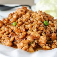 Minced Chicken with Lettuce Cup 生炒雞鬆 · Sweet and savory diced chicken and vegetables. Served with iceberg lettuce wraps.