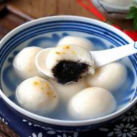 Black Sesame Sweet Rice Balls 宁波芝麻汤圆 · Made with black sesame filling. Served in a sweet rice wine soup, topped with egg drop and o...