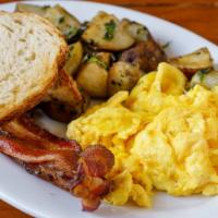 Traditional · Two scrambled eggs, bacon, homefries and sourdough toast.