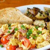 Scramble · two eggs, ham, green onion, cherry tomatoes, homefries, sourdough toast