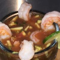 Camarones Al Mojo De Ajo · Shrimp in garlic sauce with rice, beans, lettuce, onions green peppers, guacamole and sour c...