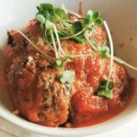 Wagyu Beef Meatballs · Diced roma tomatoes, garlic, basil, marinara, Parmesan.