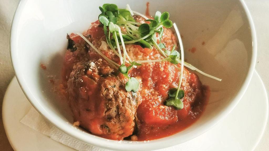 Wagyu Beef Meatballs · Diced roma tomatoes, garlic, basil, marinara, Parmesan.