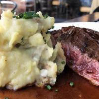 Soy Marinated Skirt Steak · Garlic-Chive Mashed Potatoes, Green Beans, Garlic-Thyme Confit, demi-glace. Gluten Free