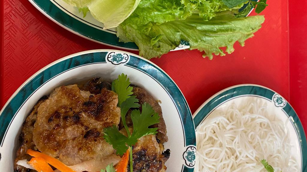 Bún Chả Miền Bắc · Pan seared pork with vermicelli noodles and dipping sauce.