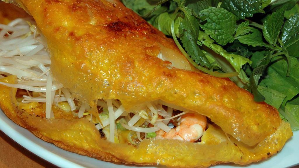 Bánh Xèo · Vietnamese Pancake with shrimp, pork, beans, bean sprouts, green onions, lettuce, and dipping sauce.