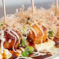 Takoyaki - Octopus Balls · Octopus balls. Battered octopus over egg tartar topped with mayonnaise, okonomiyaki sauce, f...