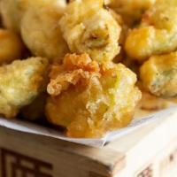 Brussels Sprouts Tempura · Crispy tempura brussels sprouts with white truffle oil. Vegetarian.