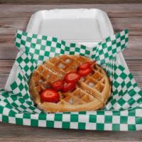 Belgian waffle · Belgian Waffle
Topped with  butter, and side of syrup or hot honey butter.