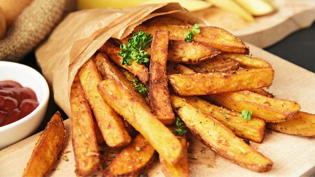 French Fries · Hand-cut potatoes fried to perfection.