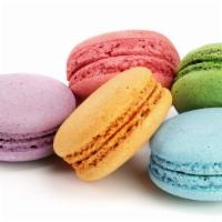 Fresh Macaroons · Three pieces of assorted macaroons.