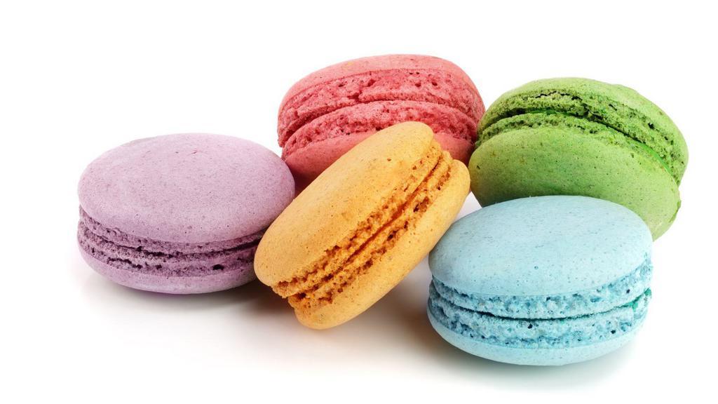 Fresh Macaroons · Three pieces of assorted macaroons.