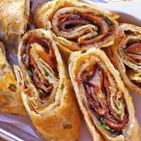 Beef Pancake Wrap · Hand-kneaded crispy scallion pancake wrapped around tender braised beef shank with our speci...