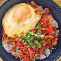 Tomato Pork Rice Bowl with Fried Egg · Slow cooked minced pork with tomatoes and caramelized onion. Topped on rice with a fried egg...