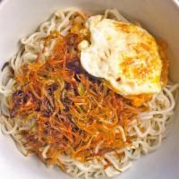 Caramelized Scallion Noodle with Fried Egg · Thinly sliced scallions caramelized in pork fat to get a crispy, fragrant golden brown, and ...