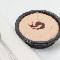 Chocolate Cheesecake · Shortbread cookie crust, chocolate cheesecake filling topped with dark chocolate.