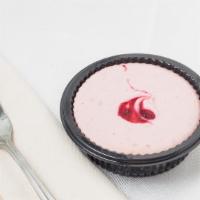 Raspberry Cheesecake · Shortbread cookie crust, raspberry cheesecake filling with raspberry pieces throughout. Topp...