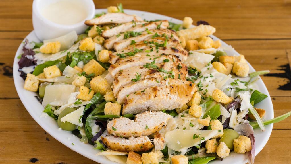 Salada de Frango · Mixed greens, grilled chicken, Parmesan cheese, olives, croutons, Parmesan dressing.