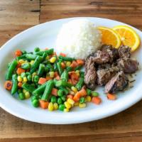 Steak Dinner · Grilled New York steak, jasmine rice, sautéed corn, carrots 
and green beans