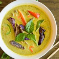 Green Curry · Green coconut milk curry, eggplant, bell peppers, and sweet basil.