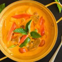 Roasted Duck Curry · Red coconut milk curry, boneless roasted duck, pineapple, cherry tomatoes, bell peppers, and...