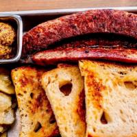 Sausage Plate · local sausage, house made pale ale pickle,  and hoppy mustard with sourdough