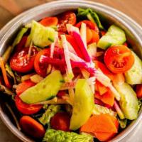 Pub Greens Salad · greens, shaved carrot, cherry tomato,  watermelon radish, and cucumber