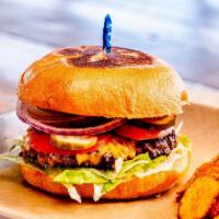 S.O.M Burger · 1/3 lb natural chuck patty on a warmed bun with pale ale pickle, tomato, shaved onion, shred...
