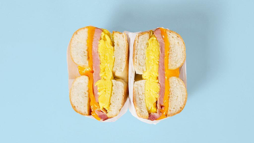 Ham Egg And Cheese Bagel · Choice of bagel with ham, 2 scrambled eggs, and cheese.