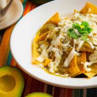 Chilaquiles (Green or Red Salsa) · Your choice of red or green sauce.  Fried corn tortillas with salsa, queso fresco, sour crea...
