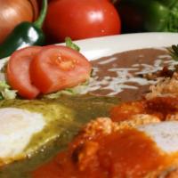 Huevos Rancheros · Two eggs on a fried corn tortilla topped with your choice of green or red sauce. Served with...