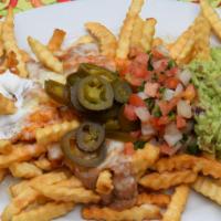 California Nachos with Meat · French fries, beans, rice, cheese, red sauce, pico de gallo, sour cream, jalapeños, and guac...