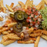California Nachos · French fries, beans, rice, cheese, red sauce, pico de gallo, sour cream, jalapeños, and guac...