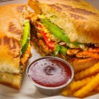  Torta & Fries · Mexican sandwich with beans, cheese, mayonnaise, lettuce, tomatoes, onions, and avocado.