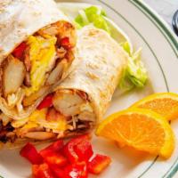 Breakfast Burrito · Eggs, cheese, red bell pepper, onions, and potatoes.