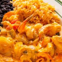 Camarones en Chipotle · Prawns sautéed in special chipotle sauce, with onions, bell pepper, mushroom, tomatoes. Rice...