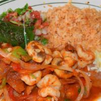 Camarones a la Diabla · Prawns cooked in hot Mexican sauce, mushrooms, green onions (extra spicy if you like).