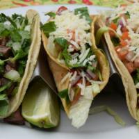 Regular Taco a la carta · Lettuce, pico de gallo and cheese.  Please let us know if you like your taco soft or hard sh...