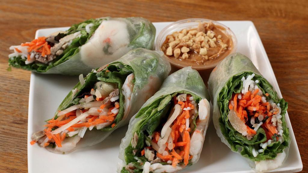 Pork and Shrimp Rolls · Sliced pork, prawns, vermicelli noodles, mango, shredded carrots, lettuce, and fresh herbs wrapped in rice paper and served with your choice of regular or spicy peanut dipping sauce. 2 rolls per order.