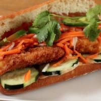 Hanoi Style Crispy Catfish · Crispy fried turmeric catfish, red curry mayo, shaved onion, pickled carrot and daikon, cucu...