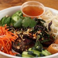 Bun Noodle Bowl with Tofu · Grilled organic tofu, vermicelli rice noodle, lettuce, pickled carrots and daikon, spicy cuc...