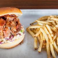 Pulled Pork Sammy · Slow smoked, 12-hour pulled pork, topped with housemade slaw and a dab of our special honey ...