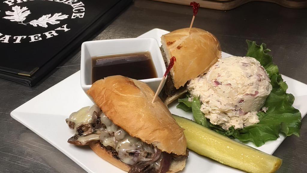 Big Dipper · Thinly sliced roast beef topped with grilled onions, mushrooms, and Swiss cheese on a toasted French roll served with au jus.