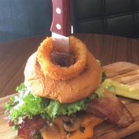 Prov Burger · A juicy burger  with grilled onion mushrooms, jalapenos, and bacon on brioche bun topped wit...